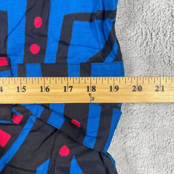 Vibrant Geometric Jumpsuit in Blue and Red - Picture 12 of 16